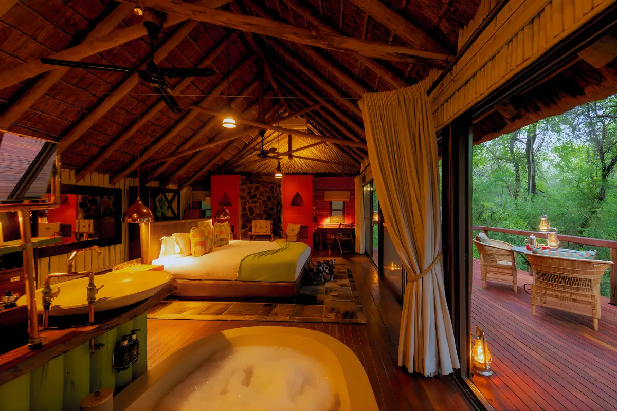 Luxury suite at Jaci’s Tree Lodge with freestanding bath and private deck in Madikwe Game Reserve.