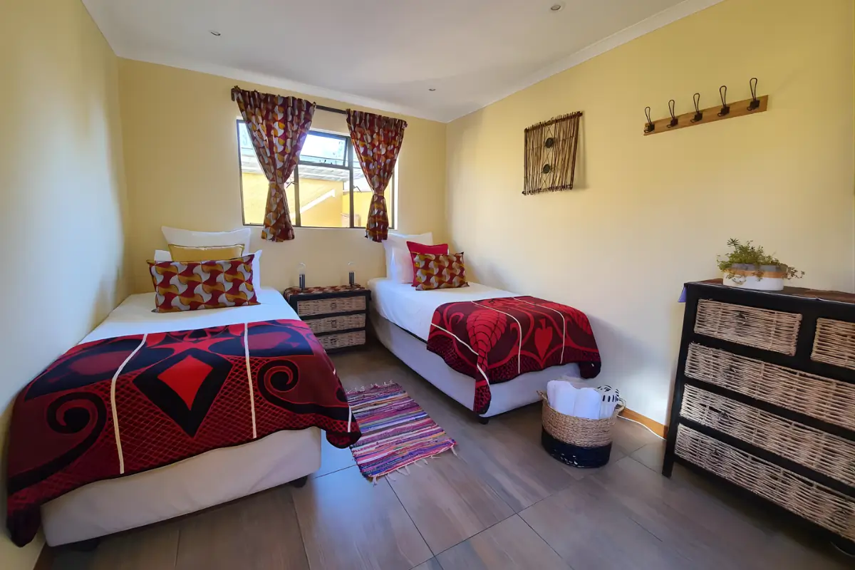 Twin room with two single beds at Lebo’s Soweto Backpackers in Orlando West, Soweto.