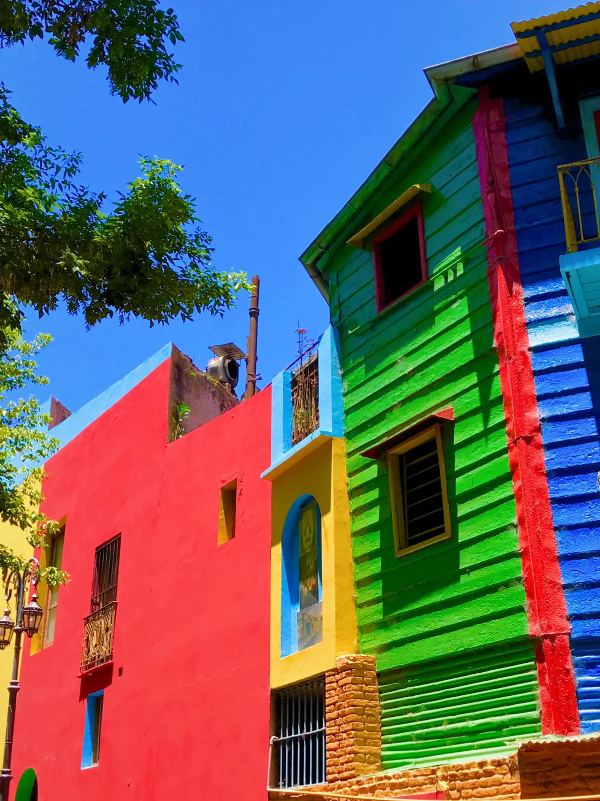 Brightly painted buildings along a street in La Boca, Buenos Aires.