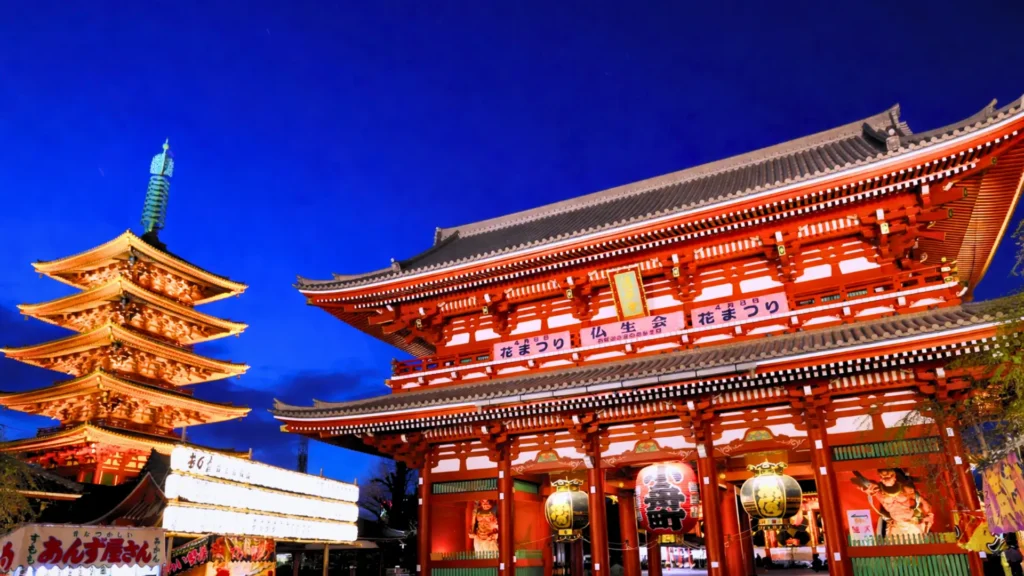 Senso-ji Temple in Asakusa at night, with the five-storey pagoda and main gate.