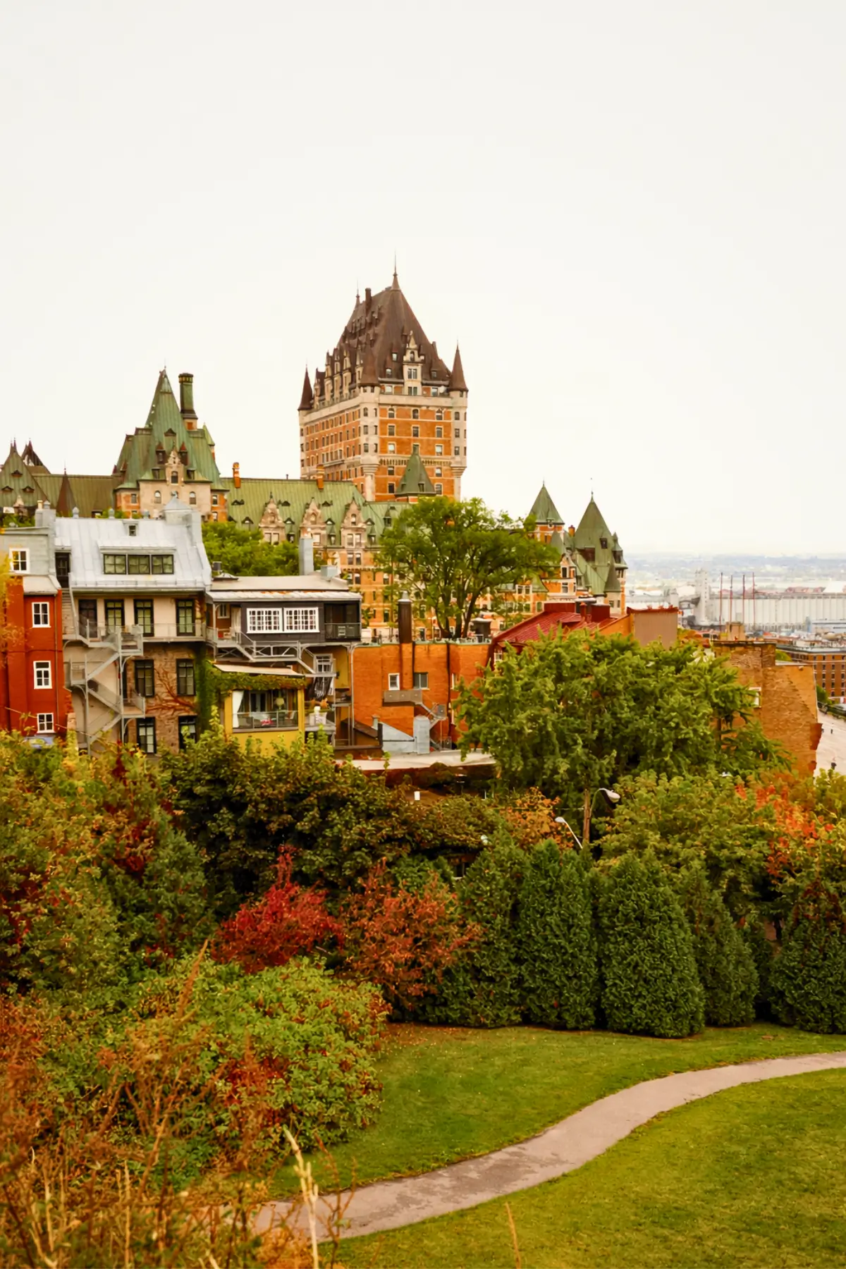 Scenic view of Old Quebec City surrounded by greenery.