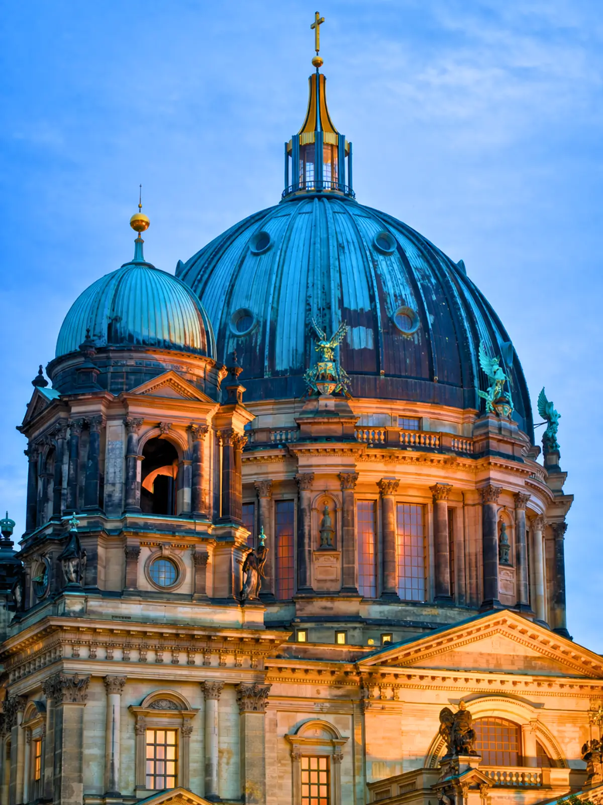 Berlin Cathedral dome with green copper roof and historic facade in central Berlin.