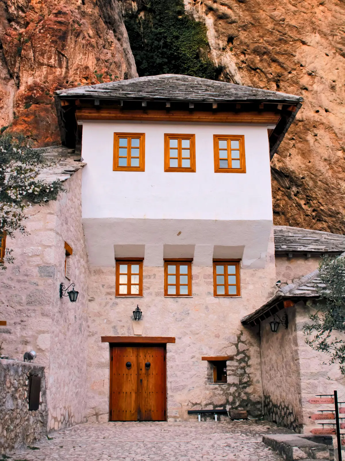 Blagaj Tekke Dervish house built against a cliff near the Buna River spring.
