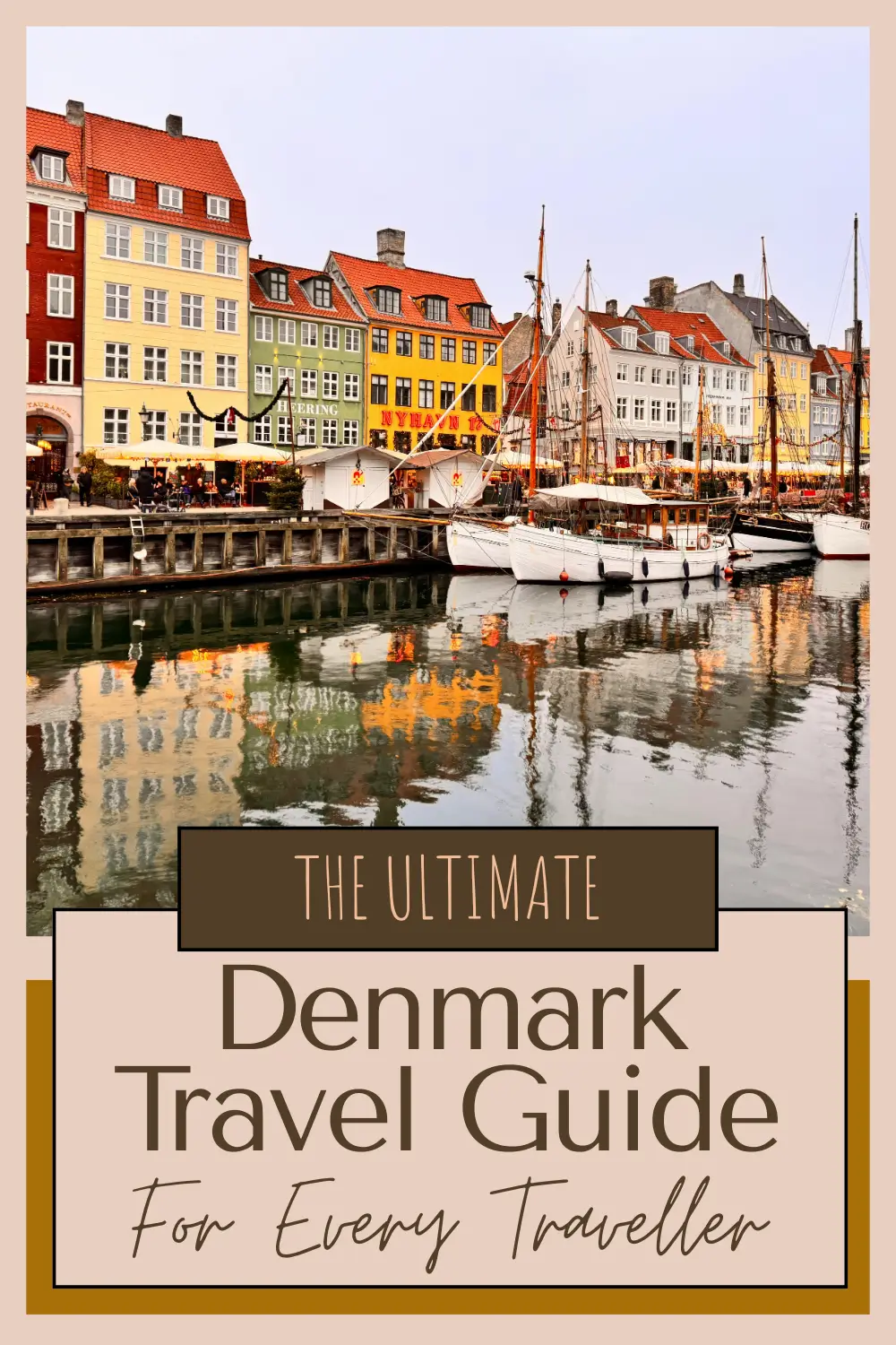 Colourful waterfront buildings and boats at Nyhavn in Copenhagen, Denmark.