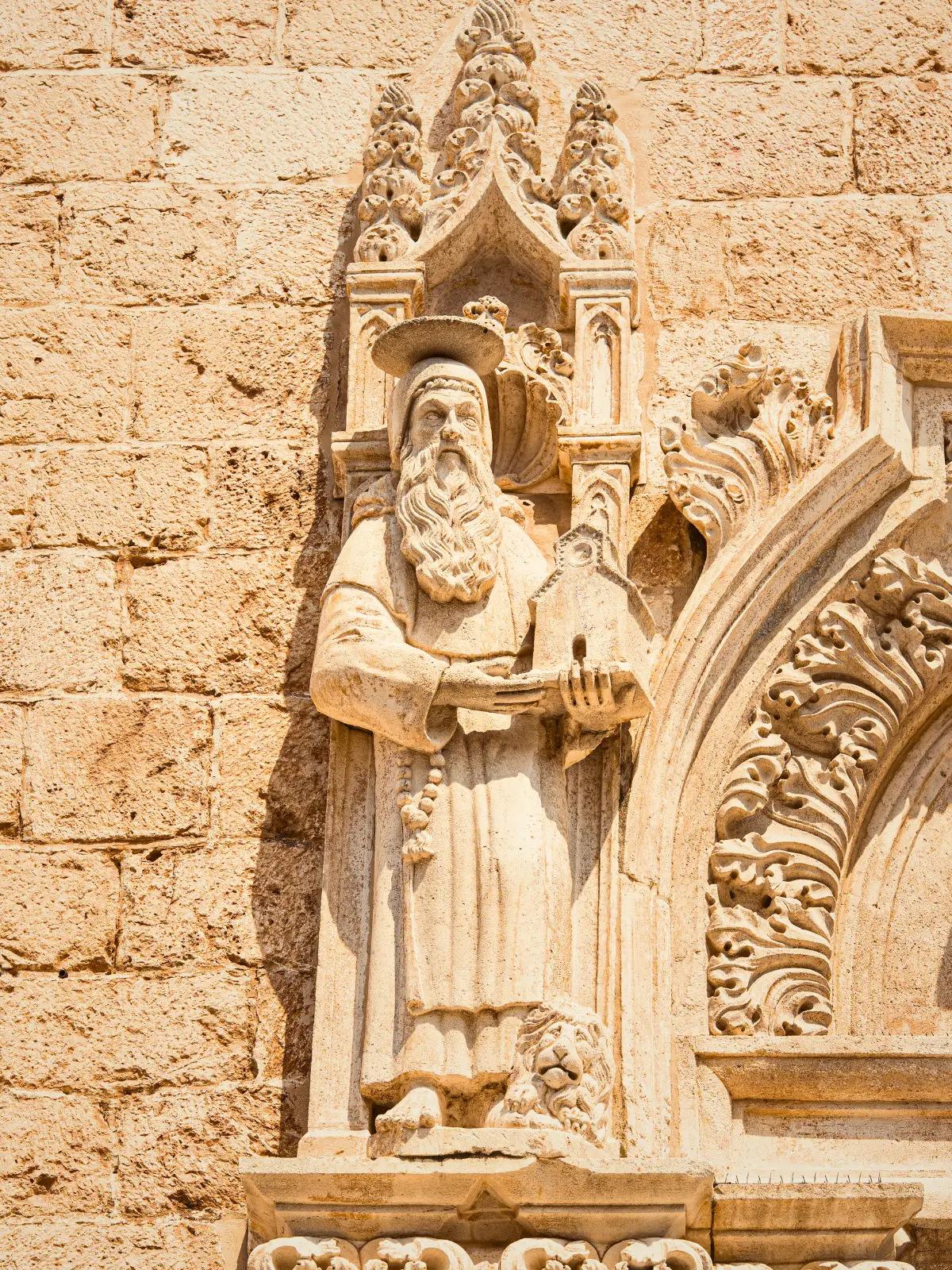 Stone statue detail on the façade of Dubrovnik Cathedral in Dubrovnik Old Town Croatia.