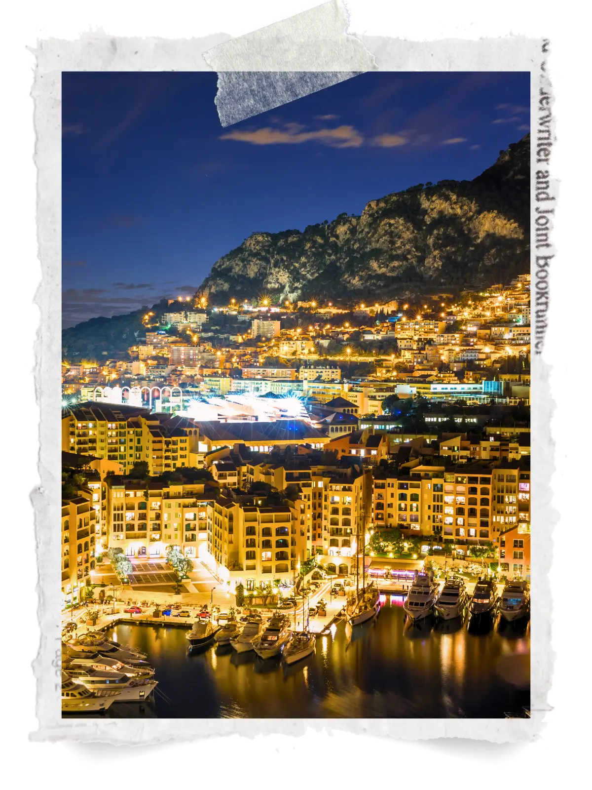 Night view of Monaco harbour with illuminated buildings, marina, and boats along the waterfront.