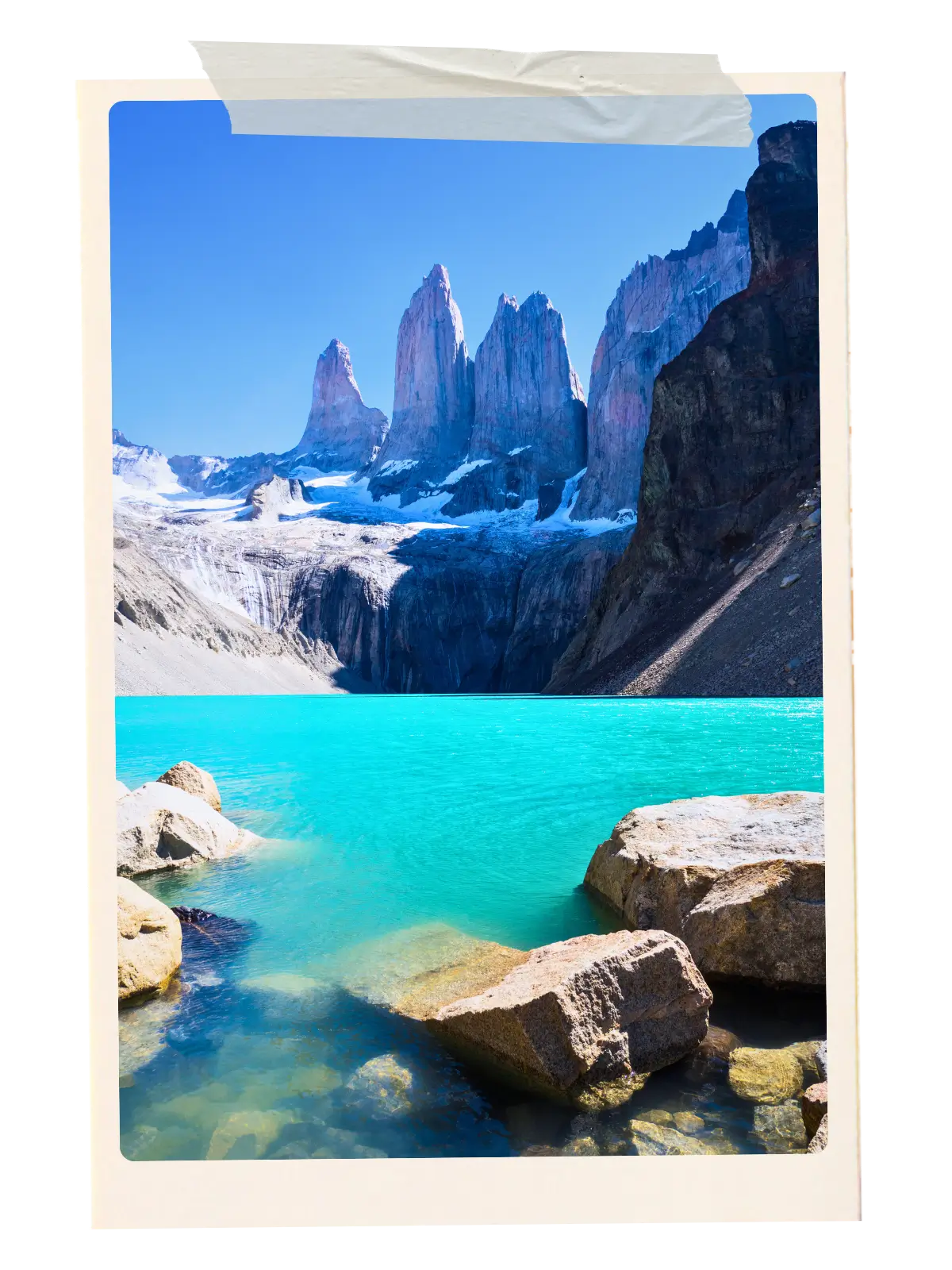 Turquoise lake with the Torres del Paine granite towers rising above Patagonia in Torres del Paine National Park, Chile.