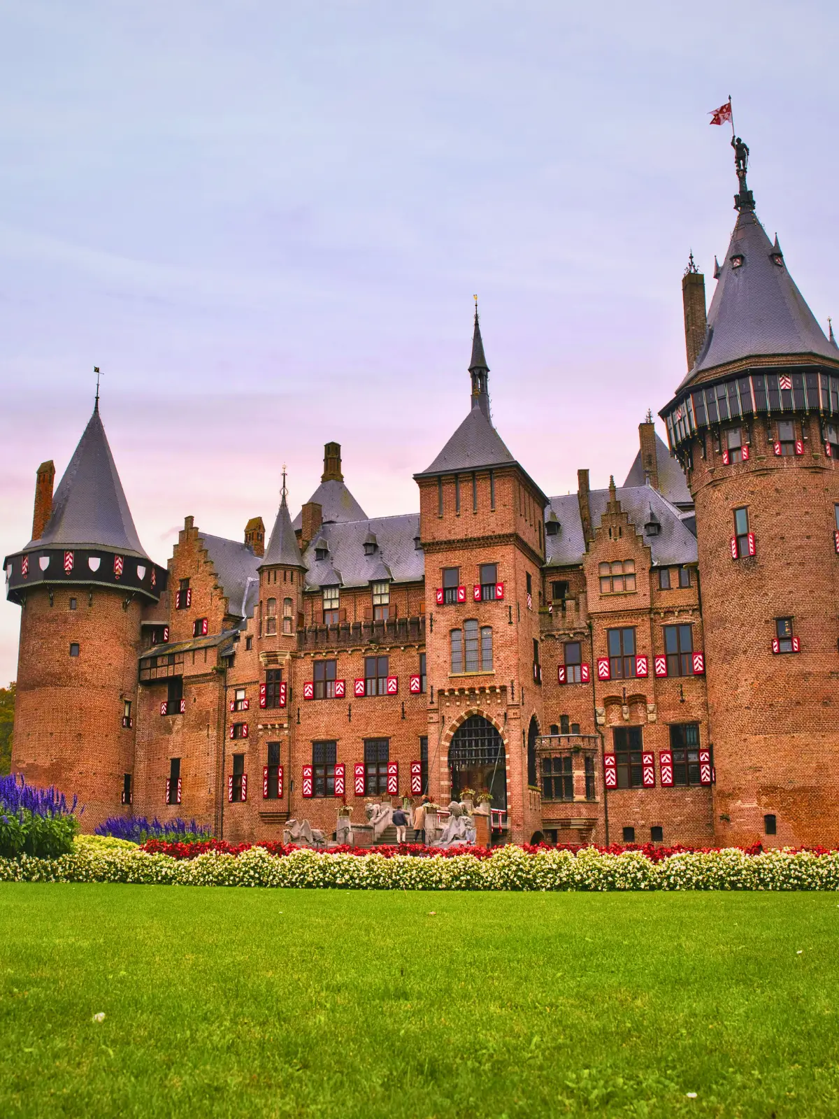 De Haar Castle with towers, gardens, and landscaped grounds in the Netherlands.