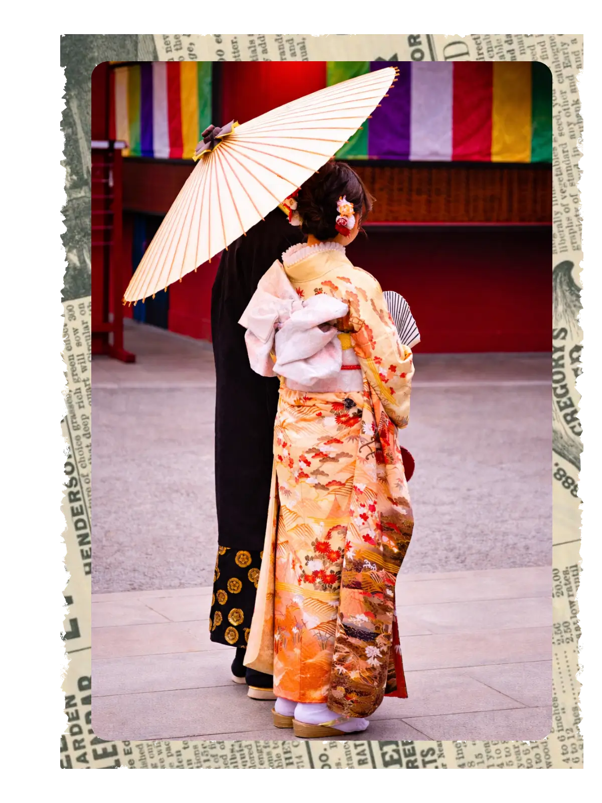 Person in a patterned kimono with a paper parasol standing outside a traditional building