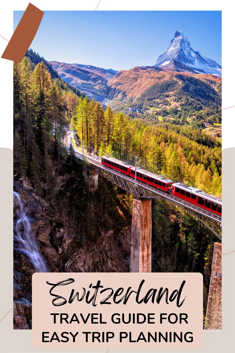Red train crossing a bridge with the Matterhorn in Zermatt rising in the background.