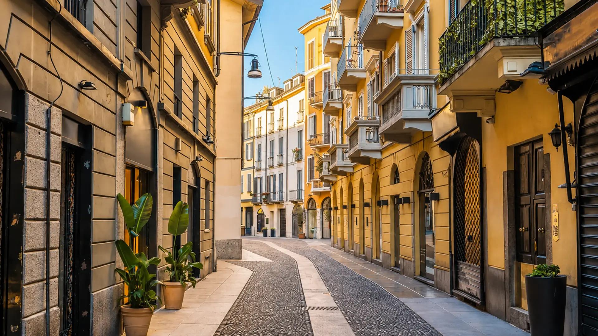 Brera street with historic buildings and balconies in Milan.