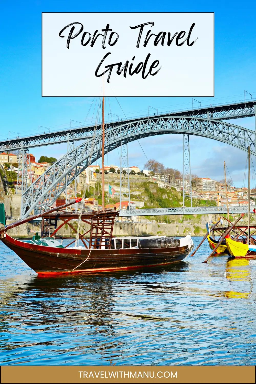 Rabelo boat on the Douro River with Dom Luís I Bridge in Porto behind it.