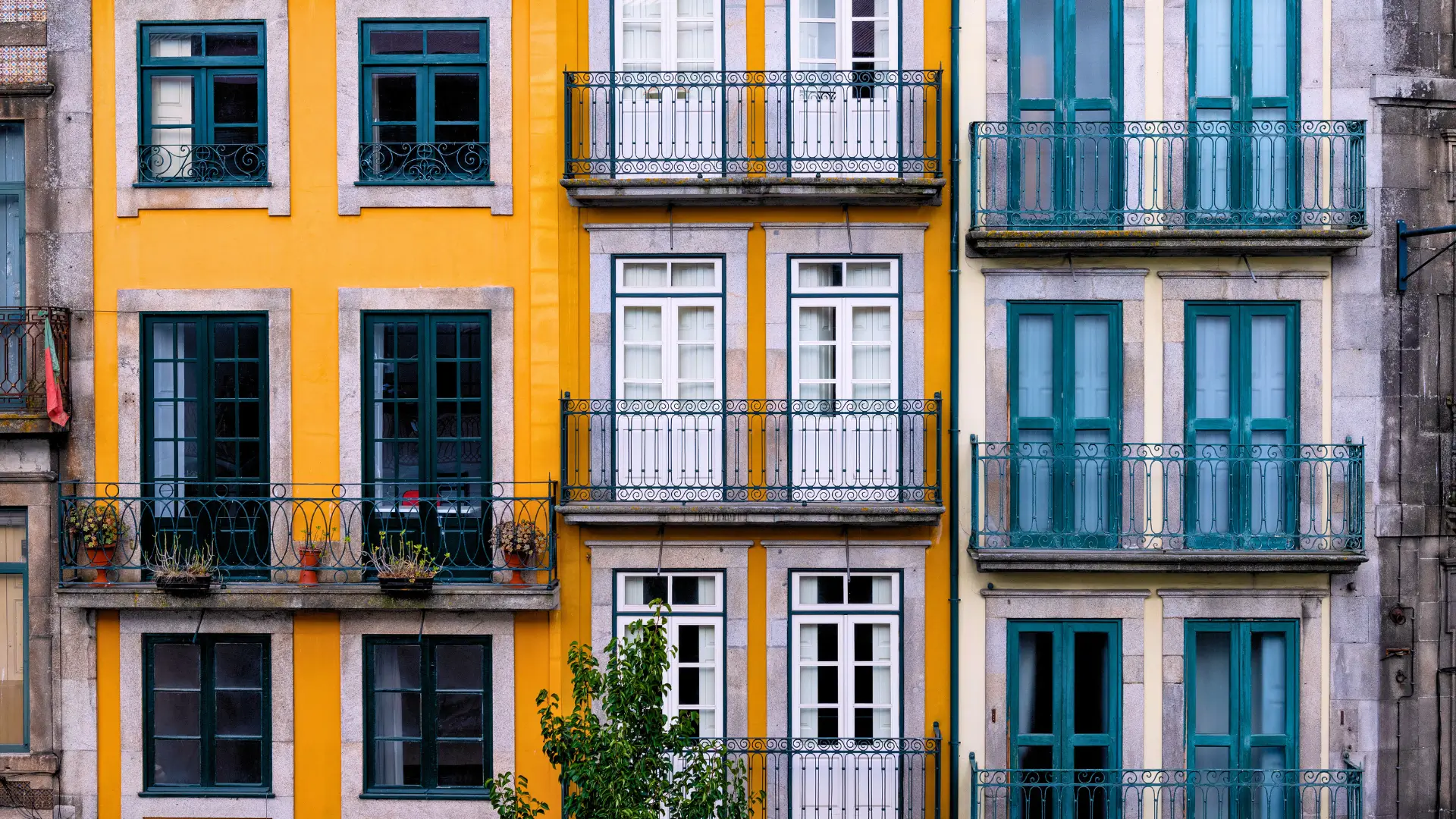 Colourful historic buildings with balconies in Baixa, Porto.