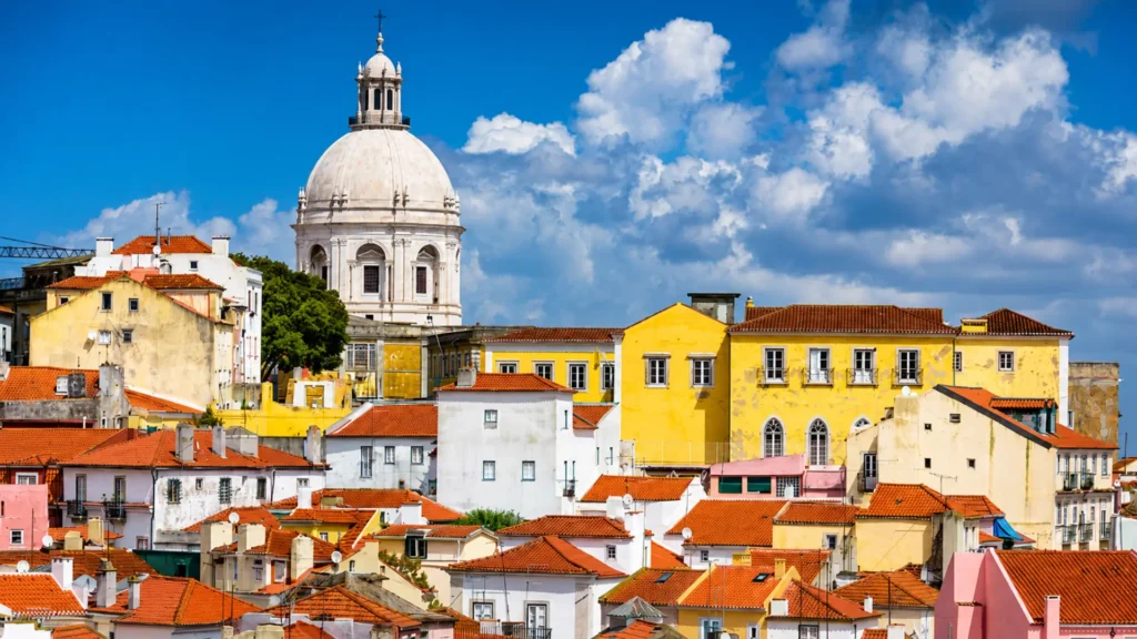 Lisbon rooftops with the National Pantheon in the background.