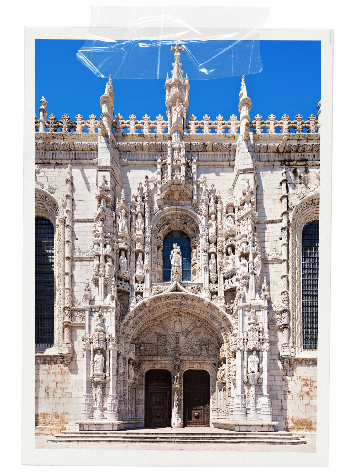 Ornate stone entrance of Jerónimos Monastery in Belém, Lisbon.