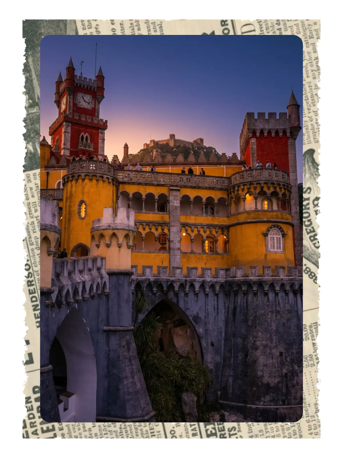 Pena Palace in Sintra at sunset with its red and yellow towers and Moorish Castle in the distance