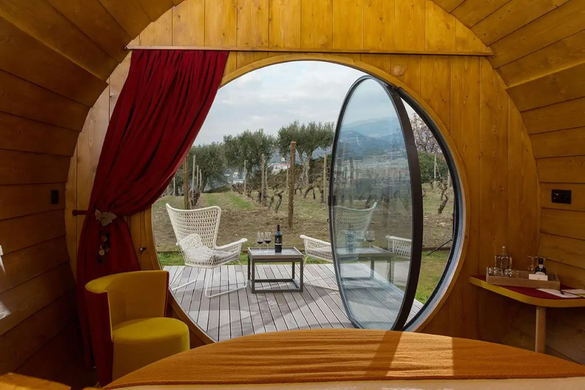 Wine barrel room at The Wine House Hotel, Quinta da Pacheca, overlooking the vineyards.