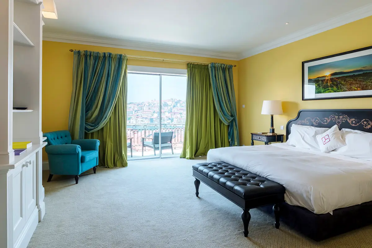 Spacious room at The Yeatman in Porto with a large bed, private balcony and views across the city.