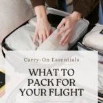 Traveller packing an open suitcase with text reading Carry-On Essentials, What to Pack for Your Flight.