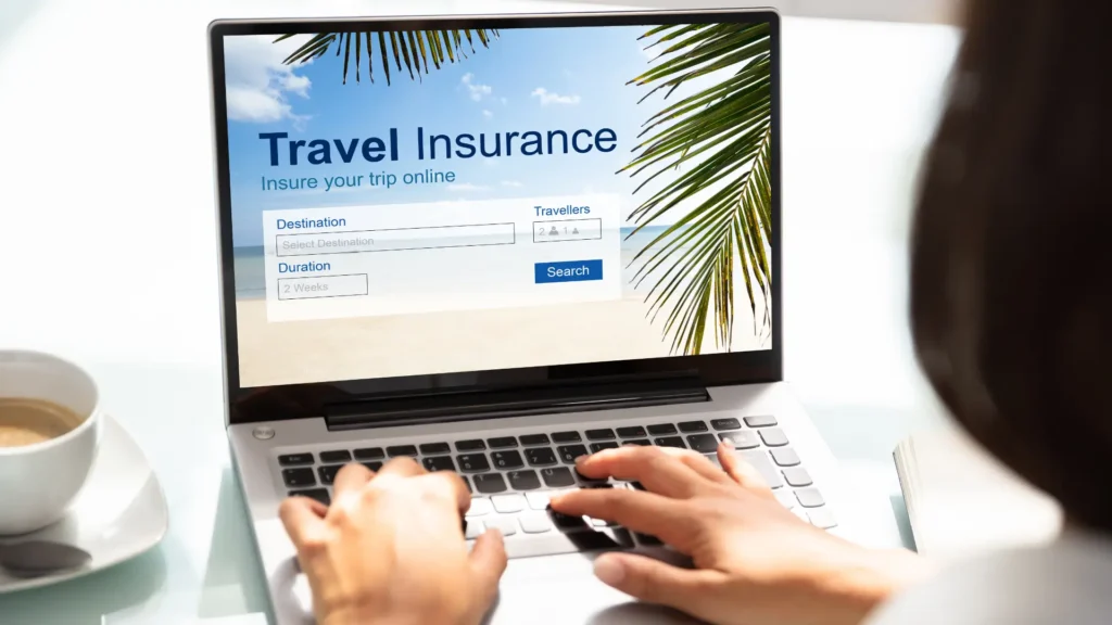 Traveller comparing travel insurance online.