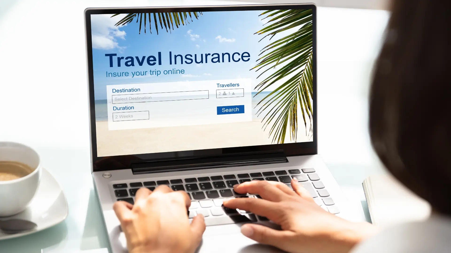 Traveller comparing travel insurance online.