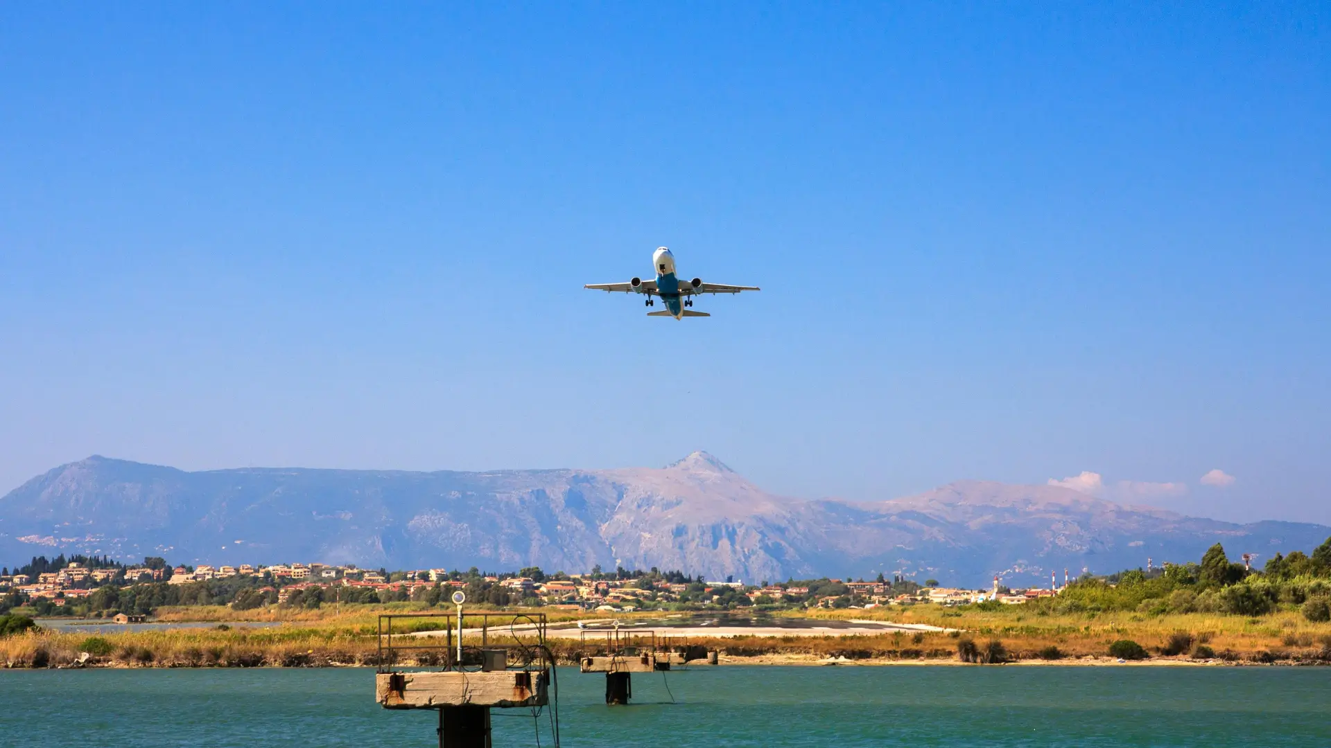 Passenger plane approaching a runway for a first-time flight.