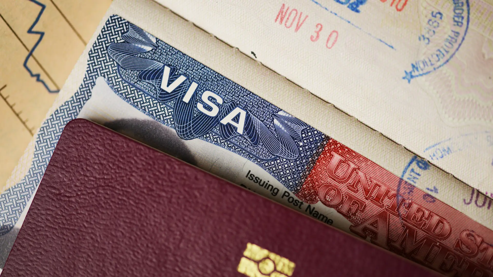 Passport showing a travel visa with international entry stamps.