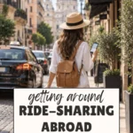 Traveller using a ride-sharing app while walking with luggage abroad.